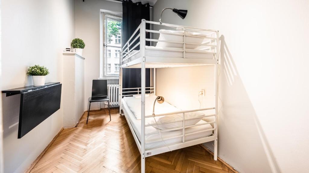 Posteľ alebo postele v izbe v ubytovaní Flamingo Premium Hostel