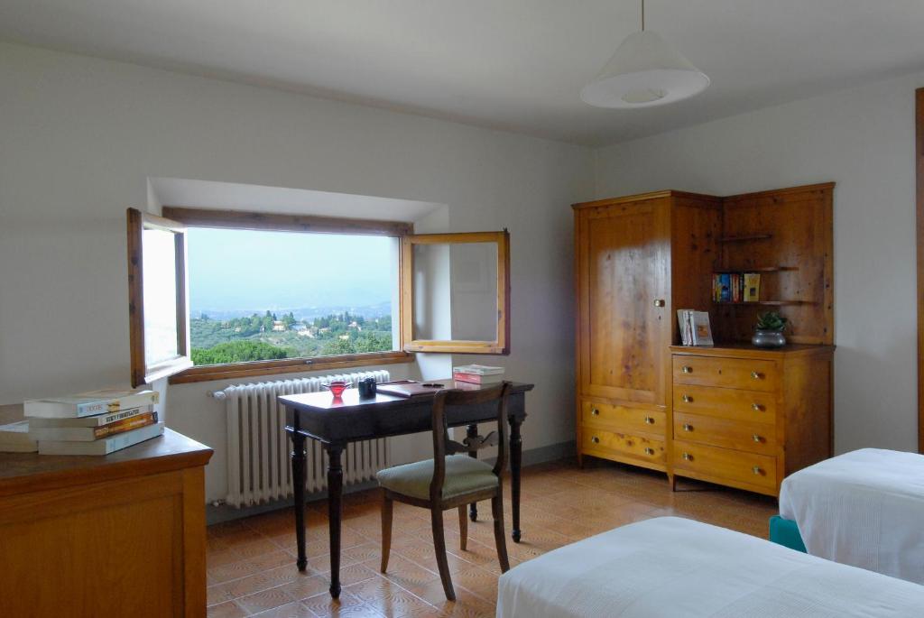 Łóżko lub łóżka w pokoju w obiekcie "Alle Montanine" Villa Poggio
