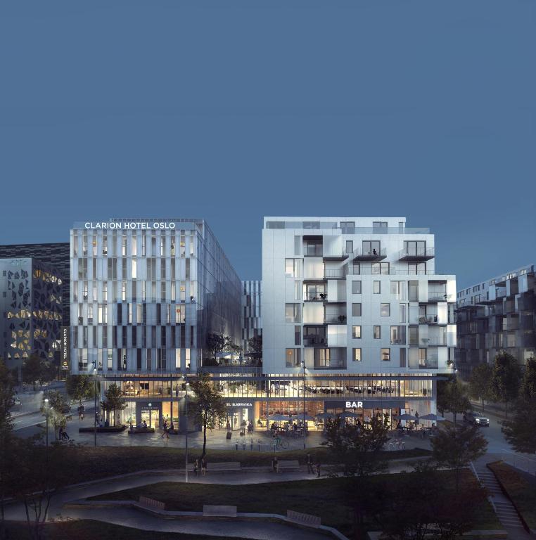 a view of two tall buildings in a city at Clarion Hotel Oslo in Oslo