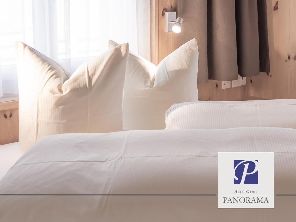 Postel nebo postele na pokoji v ubytování Hotel Garni Panorama