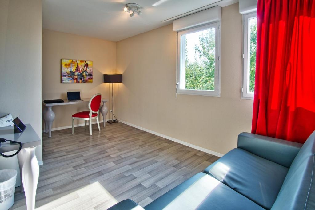 Posezení v ubytování Adonis Hotel Bayonne