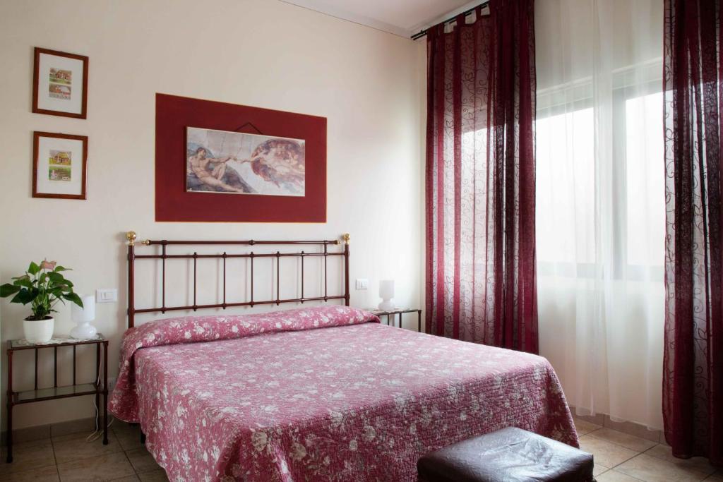 Łóżko lub łóżka w pokoju w obiekcie Al Frantoio Maddii Levane bed and breakfast