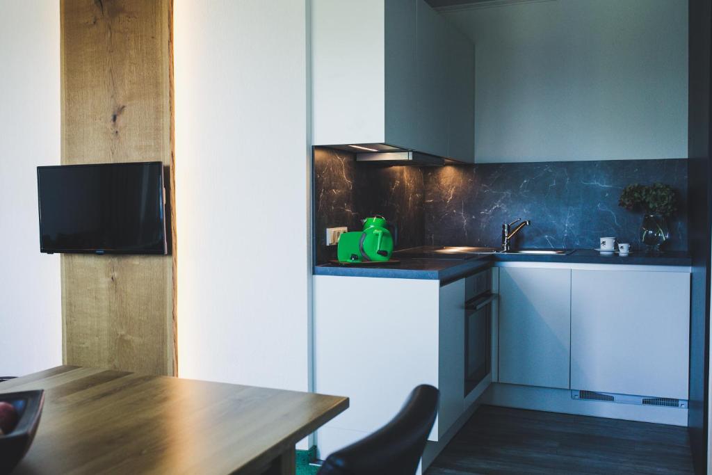 Kuchyňa alebo kuchynka v ubytovaní Appartement Sport Girbl