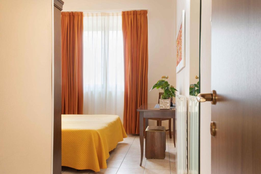 Łóżko lub łóżka w pokoju w obiekcie Al Frantoio Maddii Levane bed and breakfast