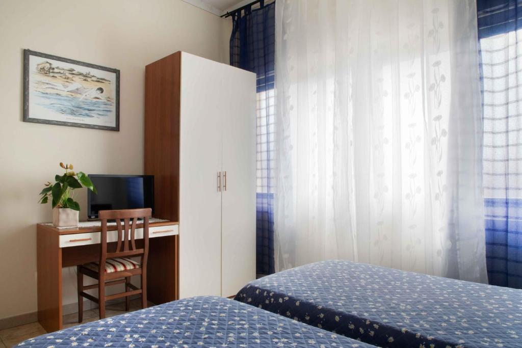 Łóżko lub łóżka w pokoju w obiekcie Al Frantoio Maddii Levane bed and breakfast