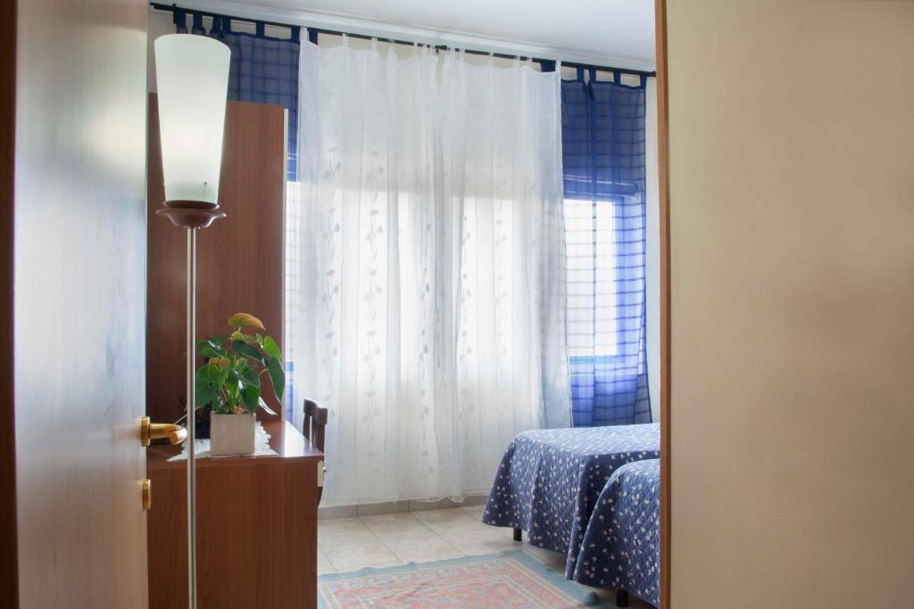 Łóżko lub łóżka w pokoju w obiekcie Al Frantoio Maddii Levane bed and breakfast