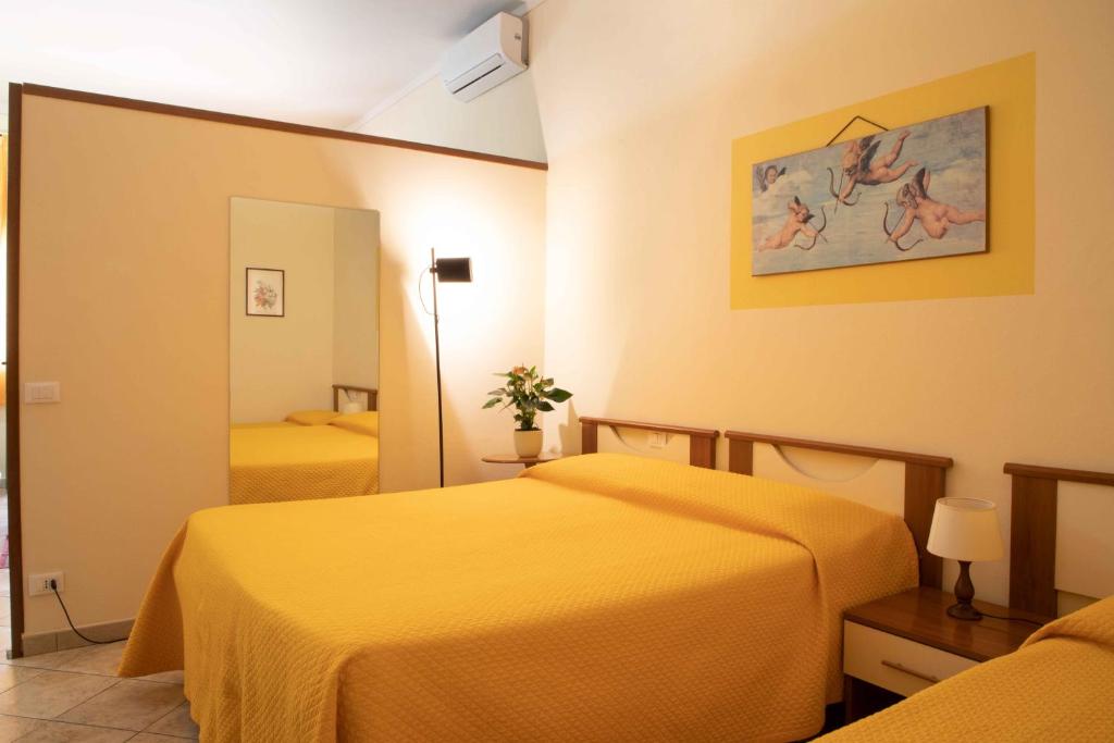 Łóżko lub łóżka w pokoju w obiekcie Al Frantoio Maddii Levane bed and breakfast