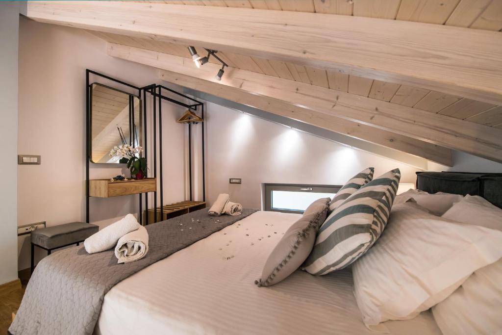Postel nebo postele na pokoji v ubytování Lefkas Villas