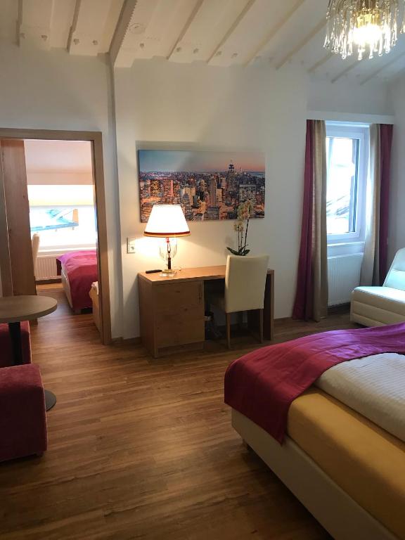 Postel nebo postele na pokoji v ubytování Berger's Sporthotel