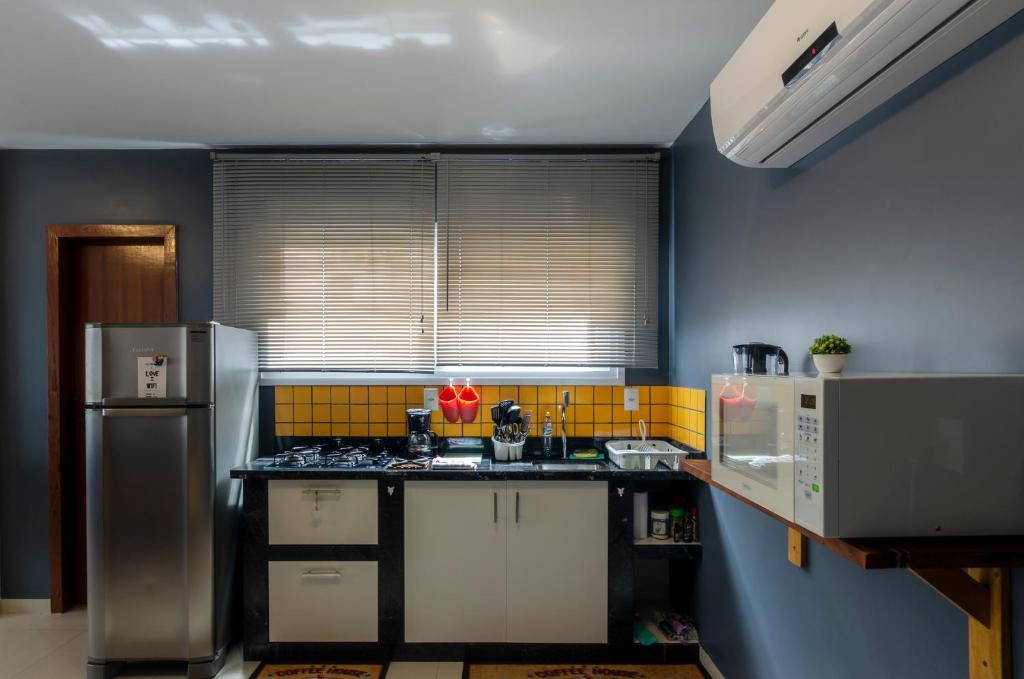Kuchyň nebo kuchyňský kout v ubytování Condominio Luna Rossa