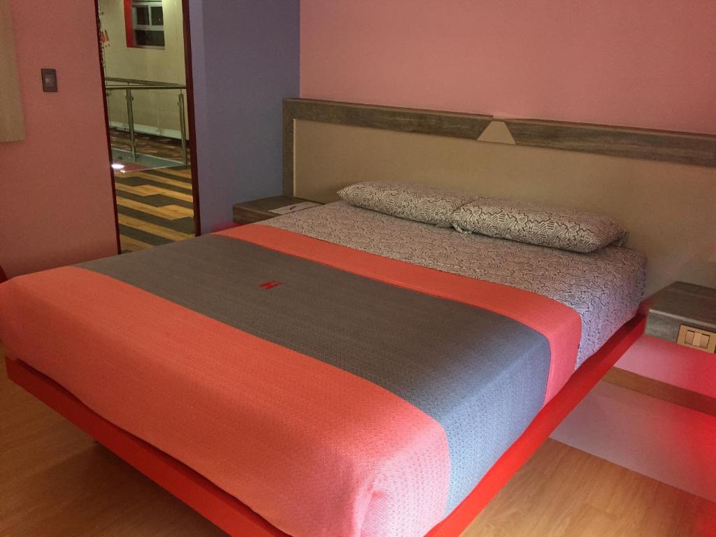 Ένα ή περισσότερα κρεβάτια σε δωμάτιο στο Hotel H - Arena Adults Only