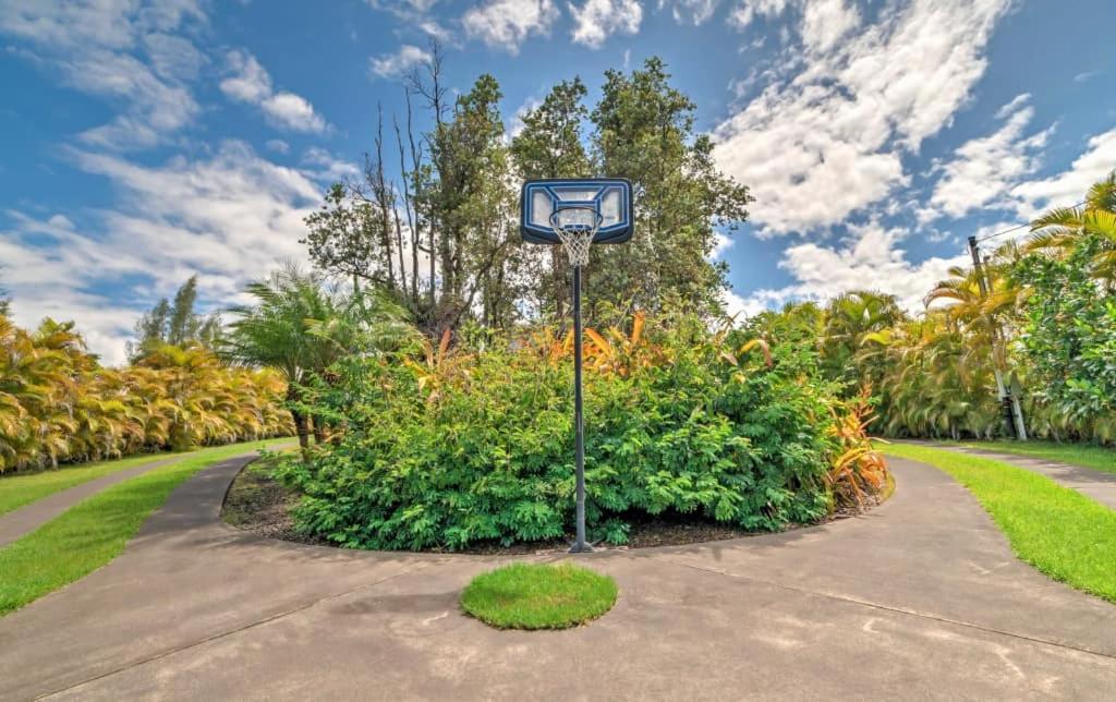 a street light in the middle of a road at Hale paradise in Keaau