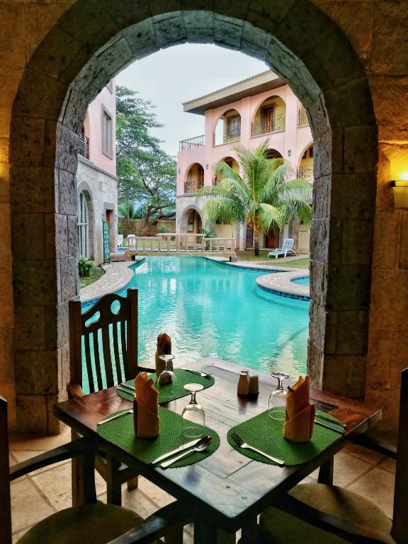 Bazén v ubytování Corto del Mar Hotel nebo v jeho okolí
