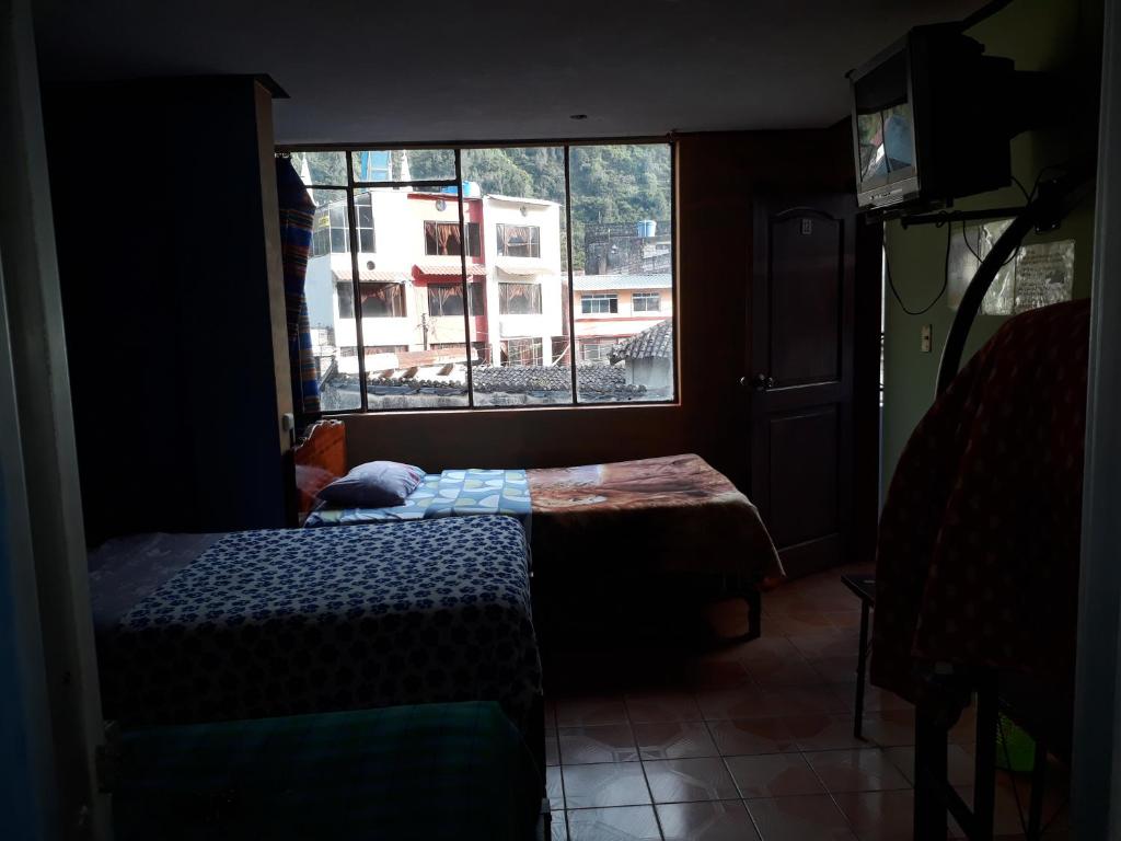 Postel nebo postele na pokoji v ubytování Transilvania