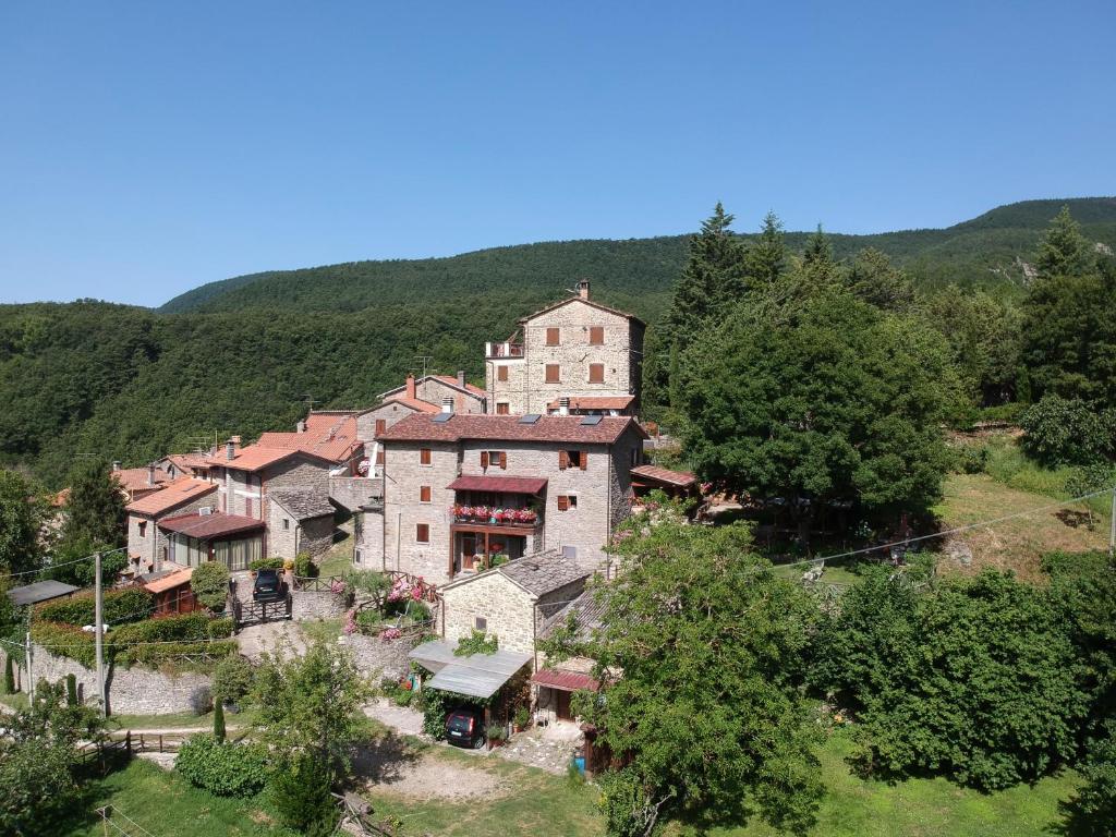 an aerial view of a large house in the mountains at Alla Battuta in Sansepolcro