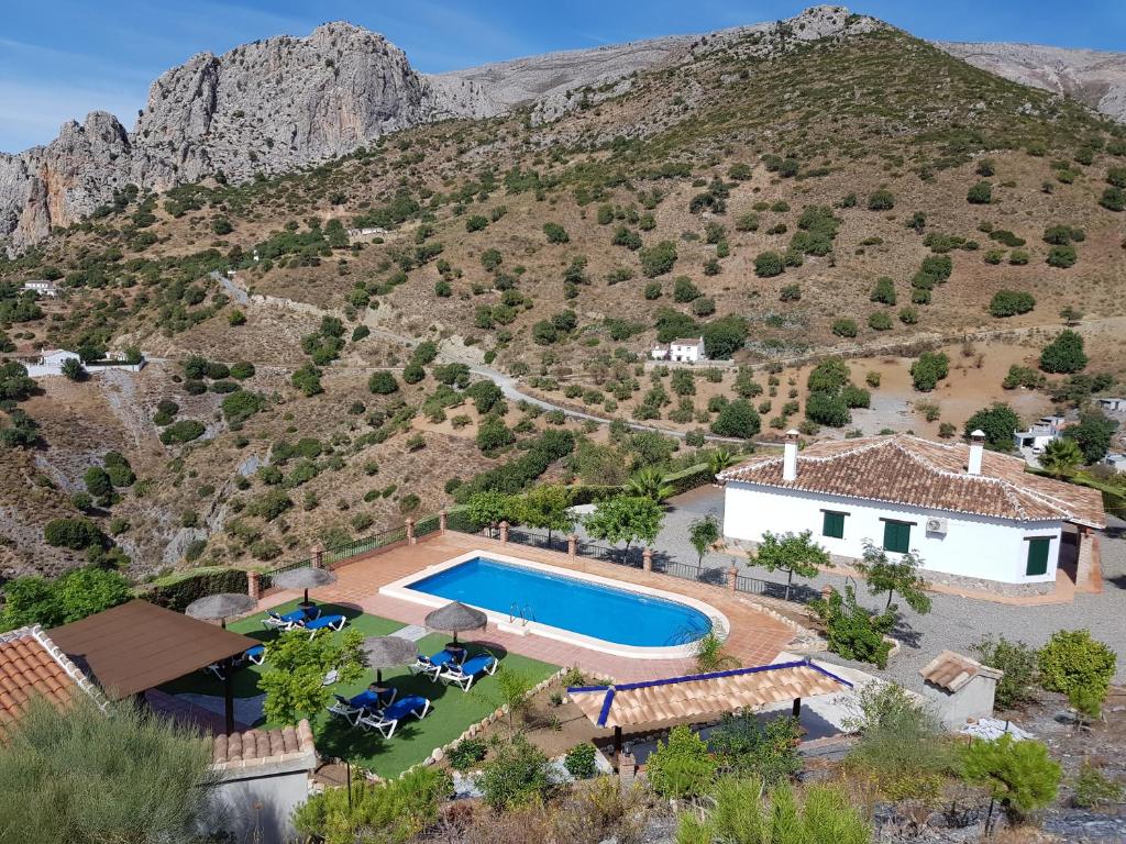an aerial view of a villa with a swimming pool at Casa Rural El Puerto in El Chorro