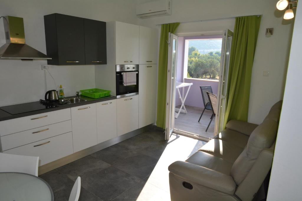 Kuchyňa alebo kuchynka v ubytovaní Apartments Dubas