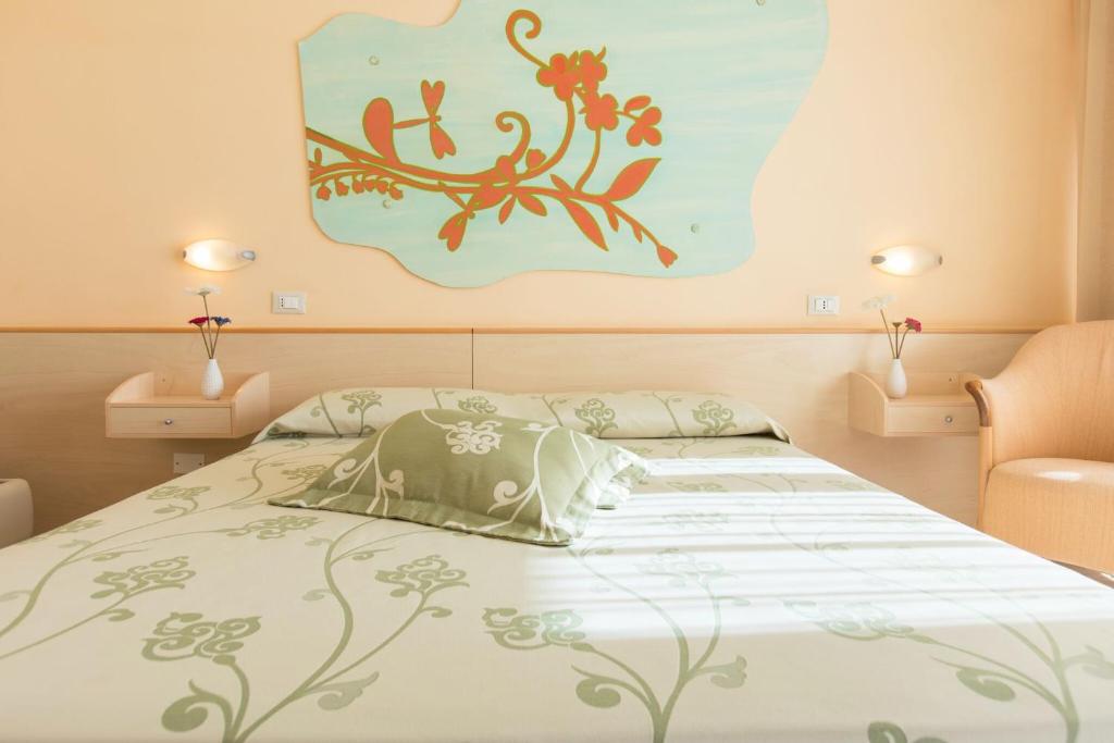 Postel nebo postele na pokoji v ubytování Savoy Hotel