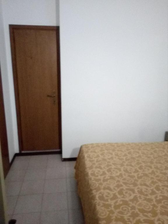 Postel nebo postele na pokoji v ubytování Hotel Torre