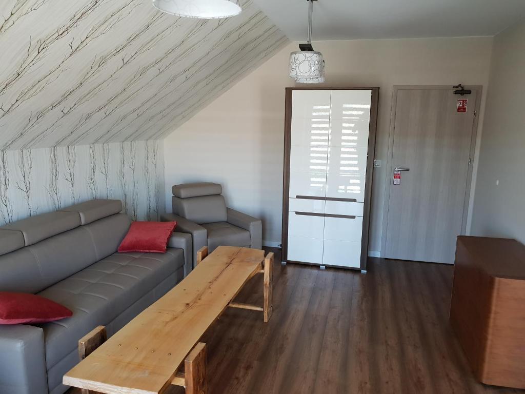 Posezení v ubytování Hotel Pod Strzechą