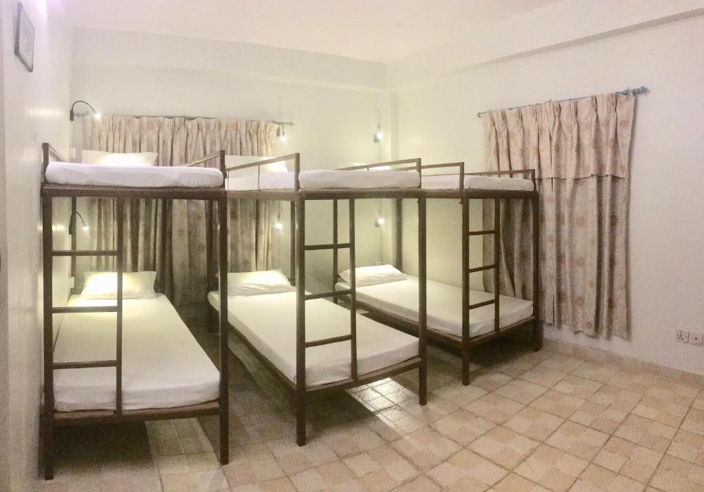 Letto o letti in una camera di The North Face Inn