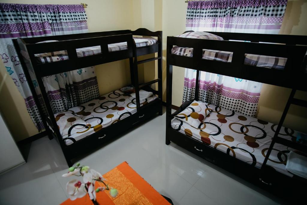 Voodi või voodid majutusasutuse Sleepadz - Capsule Beds Dormitel in Magsaysay Ave Naga toas