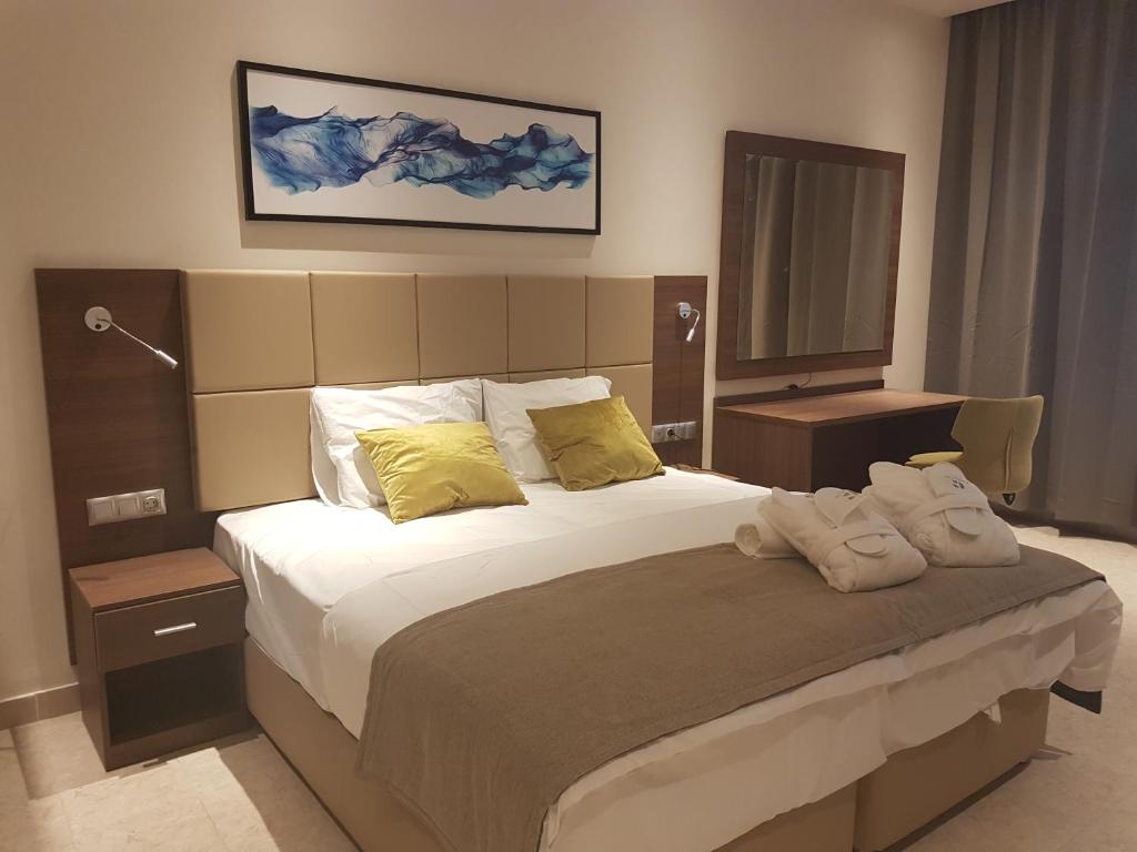 Tempat tidur dalam kamar di Capital Hotel Djibouti