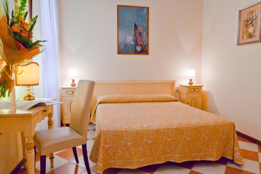 Postel nebo postele na pokoji v ubytování Hotel Henry