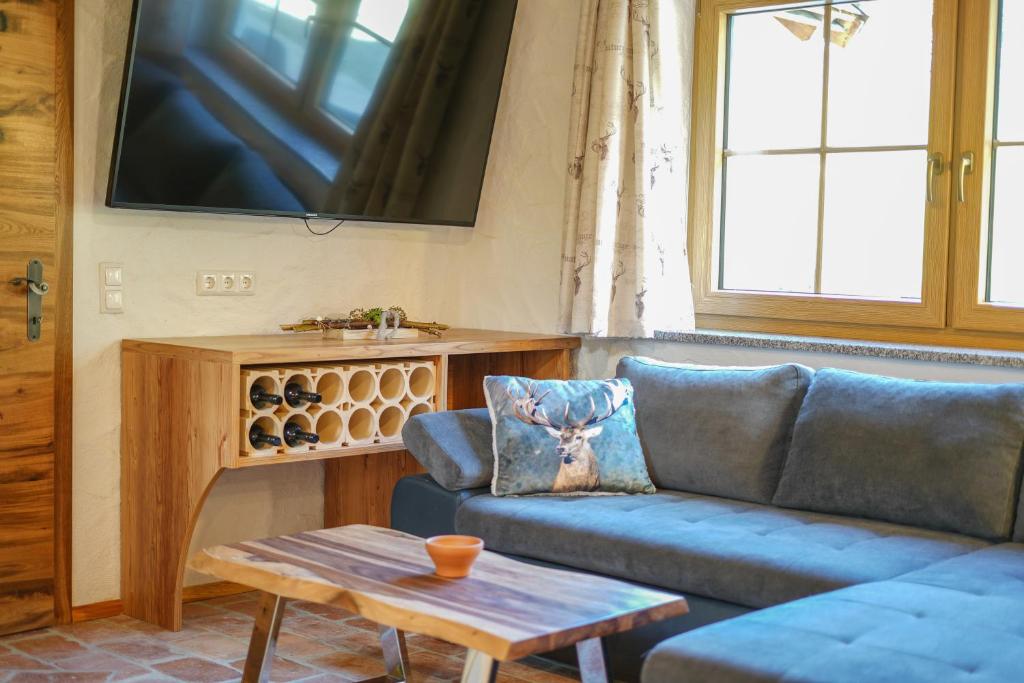 Posezení v ubytování Almchalet Pöllatal