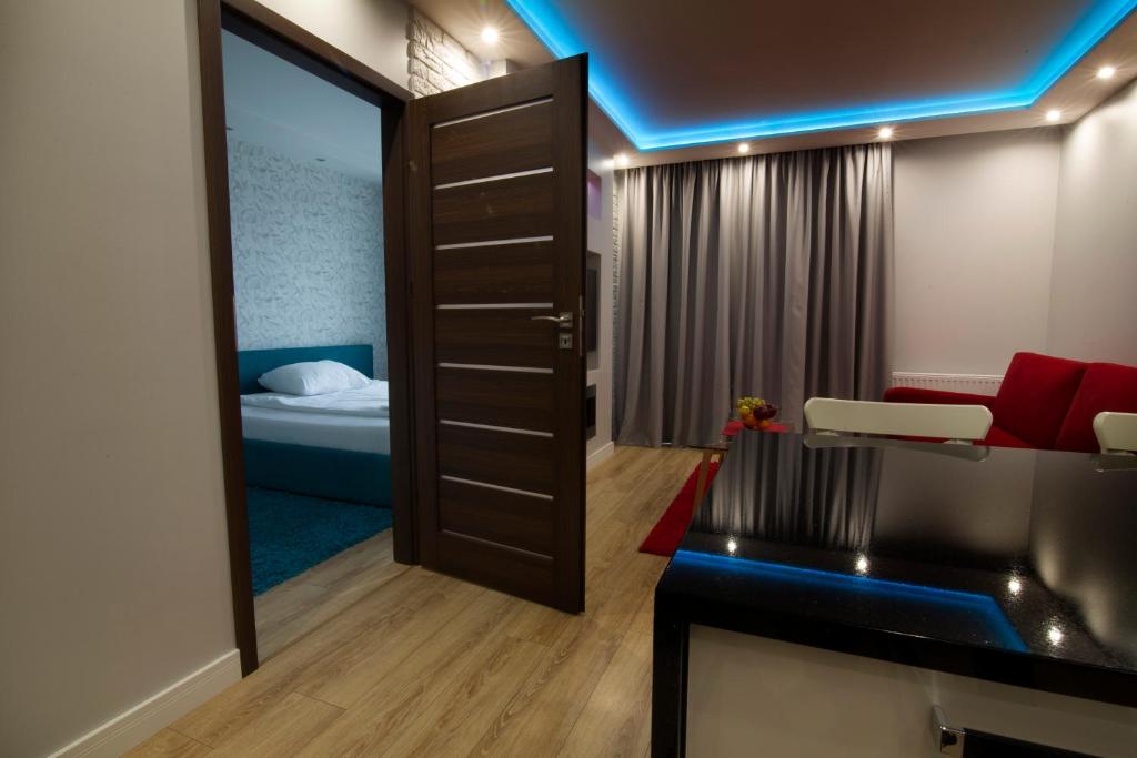 Posteľ alebo postele v izbe v ubytovaní JAB Apartments Panoramika Business & Family