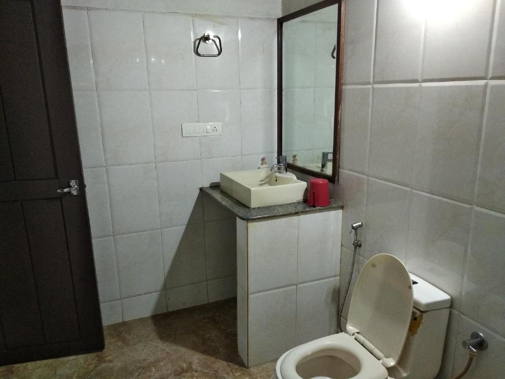 Koupelna v ubytování Kwality Estate