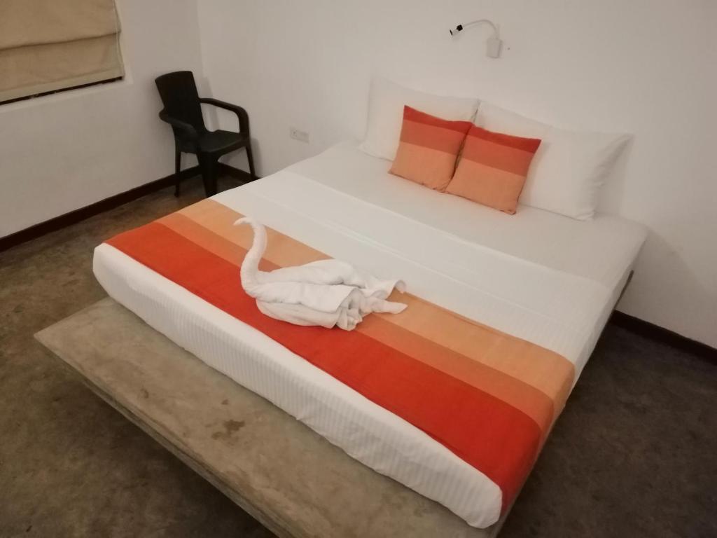 Postel nebo postele na pokoji v ubytování Kutumbaya