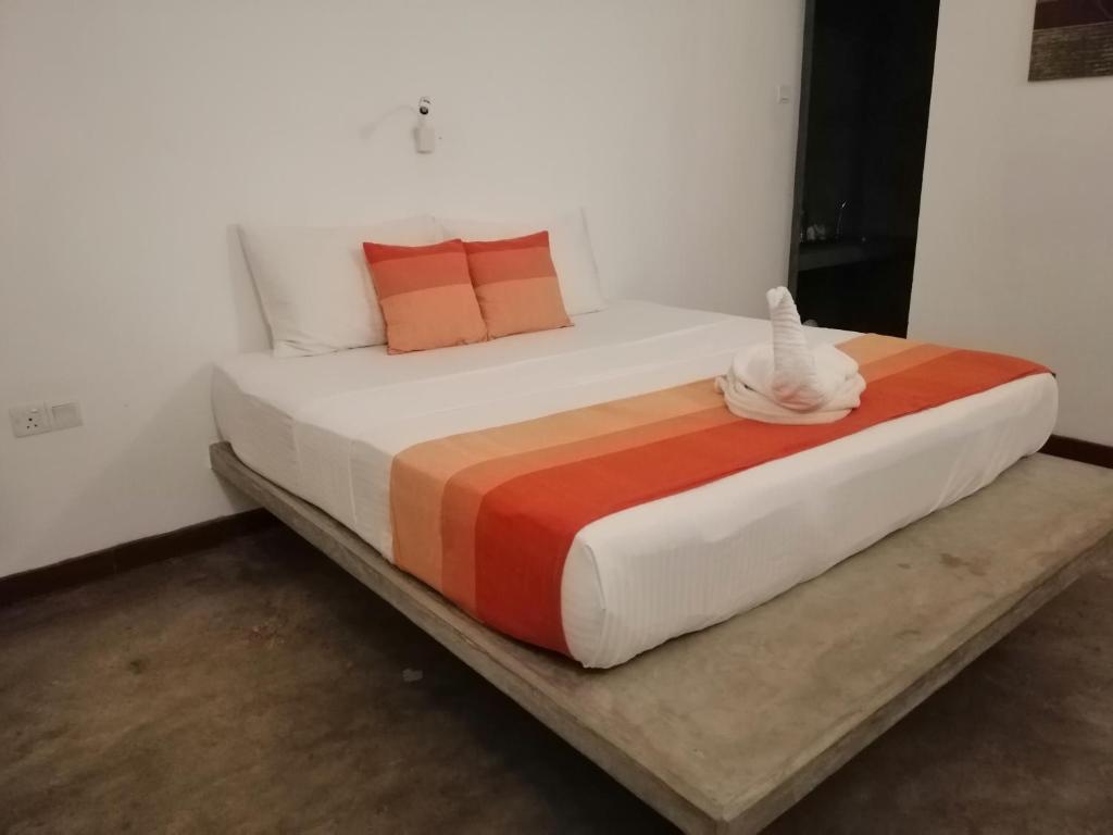 Postel nebo postele na pokoji v ubytování Kutumbaya