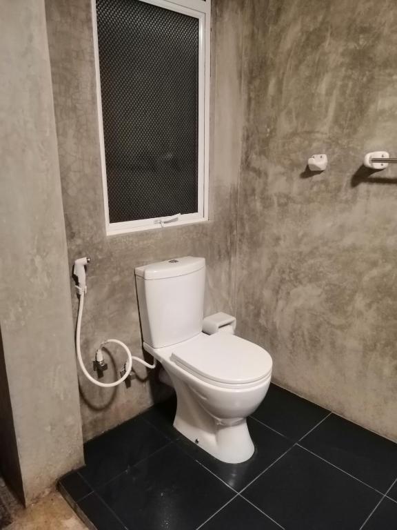 Koupelna v ubytování Kutumbaya
