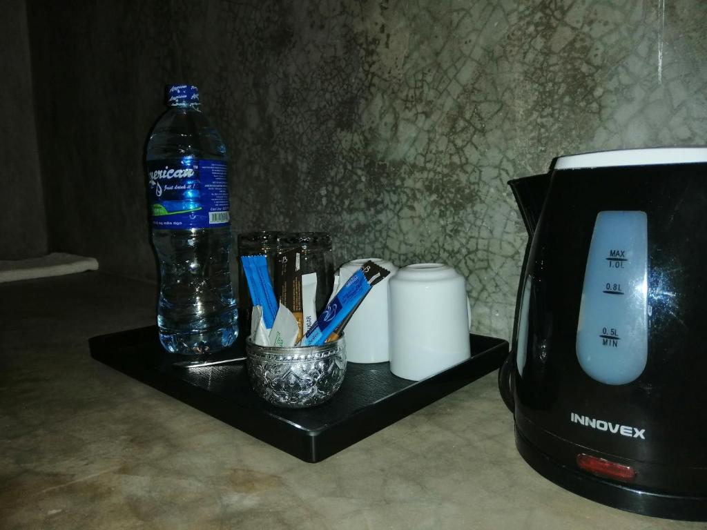 Příslušenství pro přípravu čaje a kávy v ubytování Kutumbaya