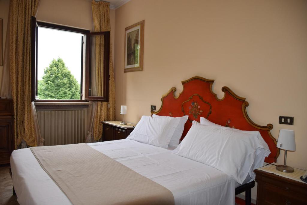 Postel nebo postele na pokoji v ubytování Park Hotel Elefante