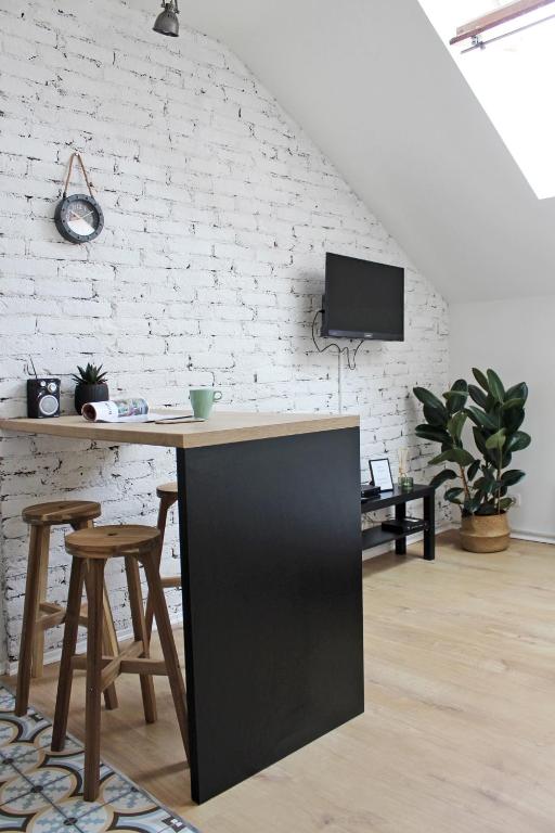 Telewizja i/lub zestaw kina domowego w obiekcie Studio apartman Trešnjevka