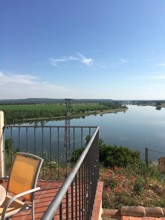 a view of a river from a balcony at ALTO DE LA RESERVA in Castronuño