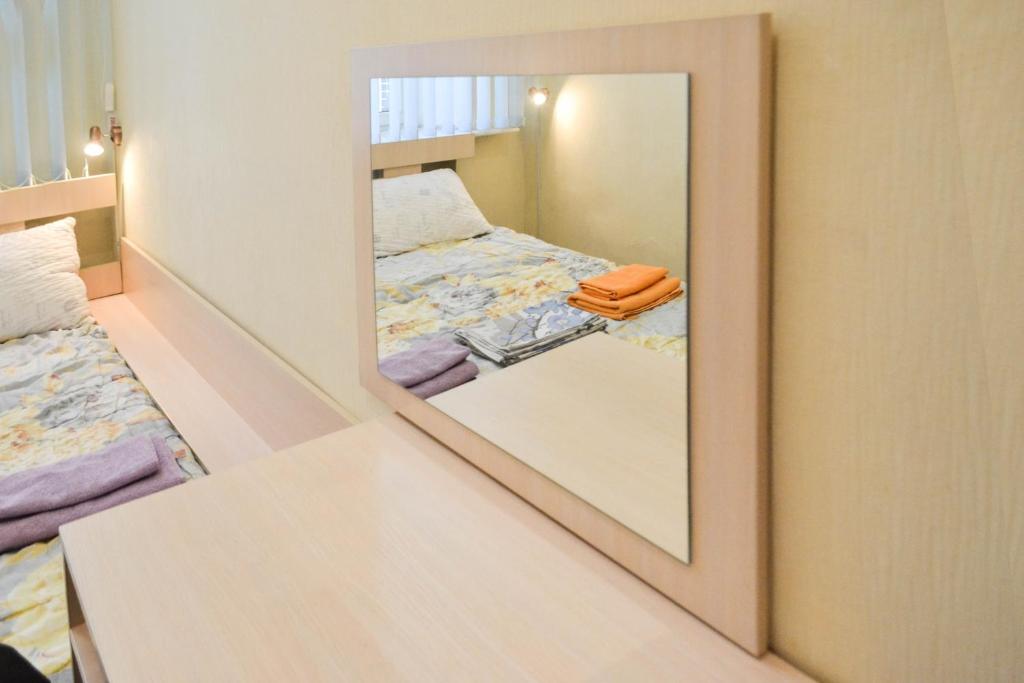 Postel nebo postele na pokoji v ubytování Vishnya Hostel