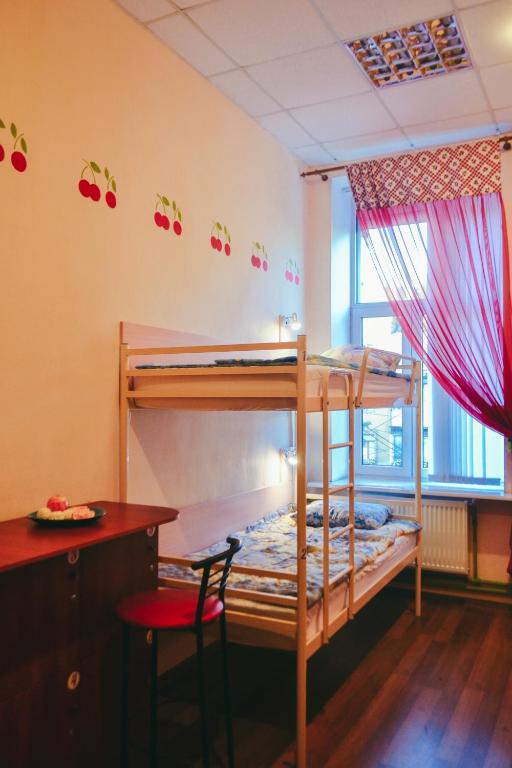 Postel nebo postele na pokoji v ubytování Vishnya Hostel