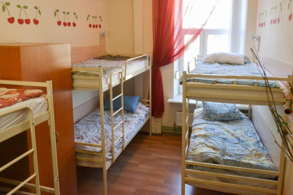 Postel nebo postele na pokoji v ubytování Vishnya Hostel