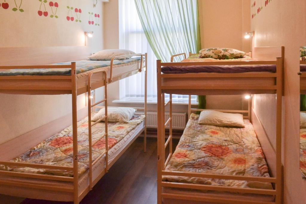 Postel nebo postele na pokoji v ubytování Vishnya Hostel