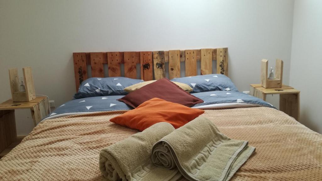 Postelja oz. postelje v sobi nastanitve Hostal Mi Paz