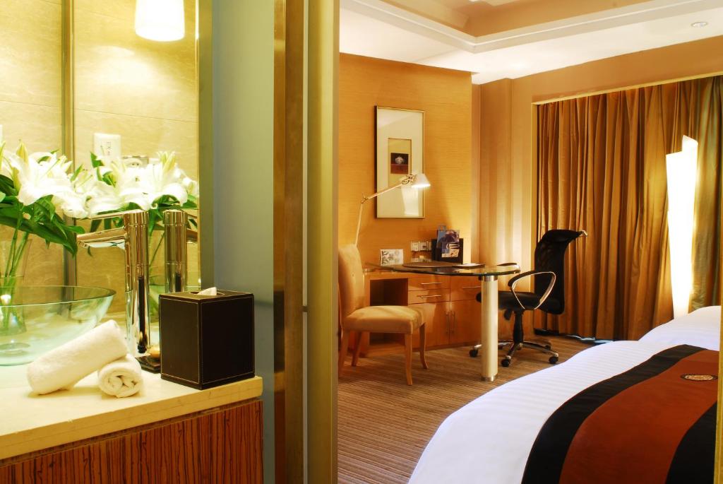 Postel nebo postele na pokoji v ubytování Sofitel Xi'an On Renmin Square