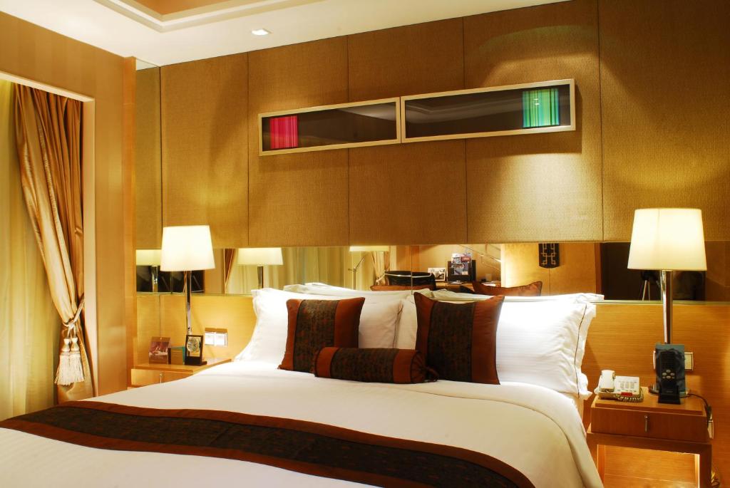 Postel nebo postele na pokoji v ubytování Sofitel Xi'an On Renmin Square