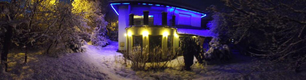 a person walking down a snow covered street at night at 10 os - Gdansk-Sopot-Gdynia up to 19 persons in Gdynia