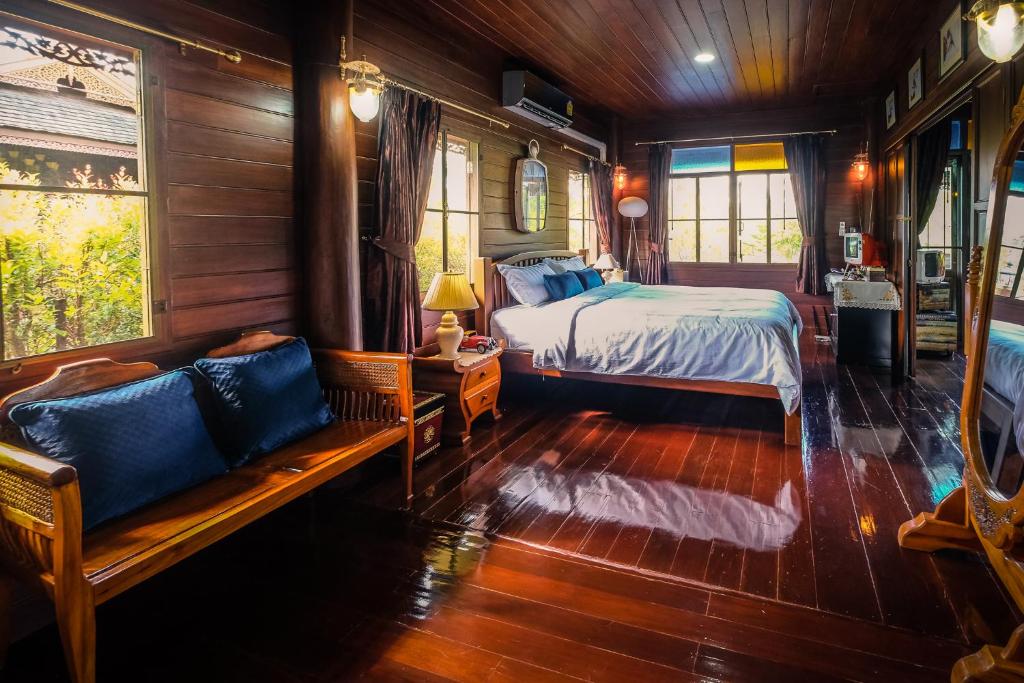 Postel nebo postele na pokoji v ubytování Rommai Villa Chiang Rai