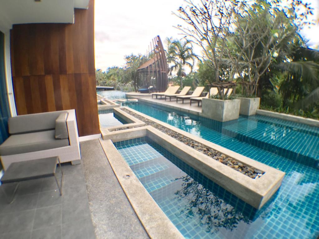 Bazén v ubytování Mida de Sea Residence Hua Hin nebo v jeho okolí