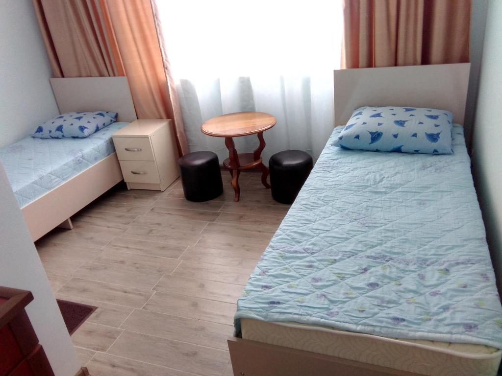 Postel nebo postele na pokoji v ubytování Str.Agmashenebeli 548