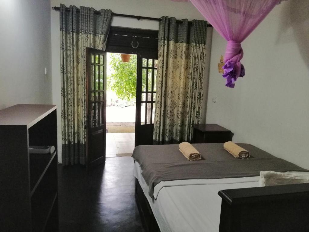 Postel nebo postele na pokoji v ubytování Villa Eden Paradise